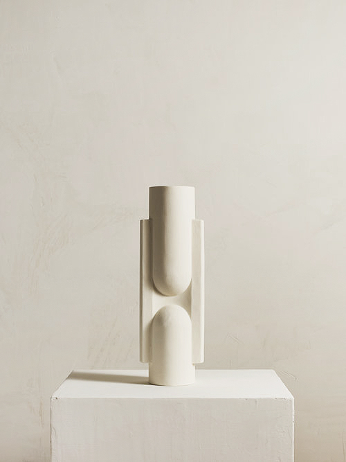 Product photography of a minimalist beige vase