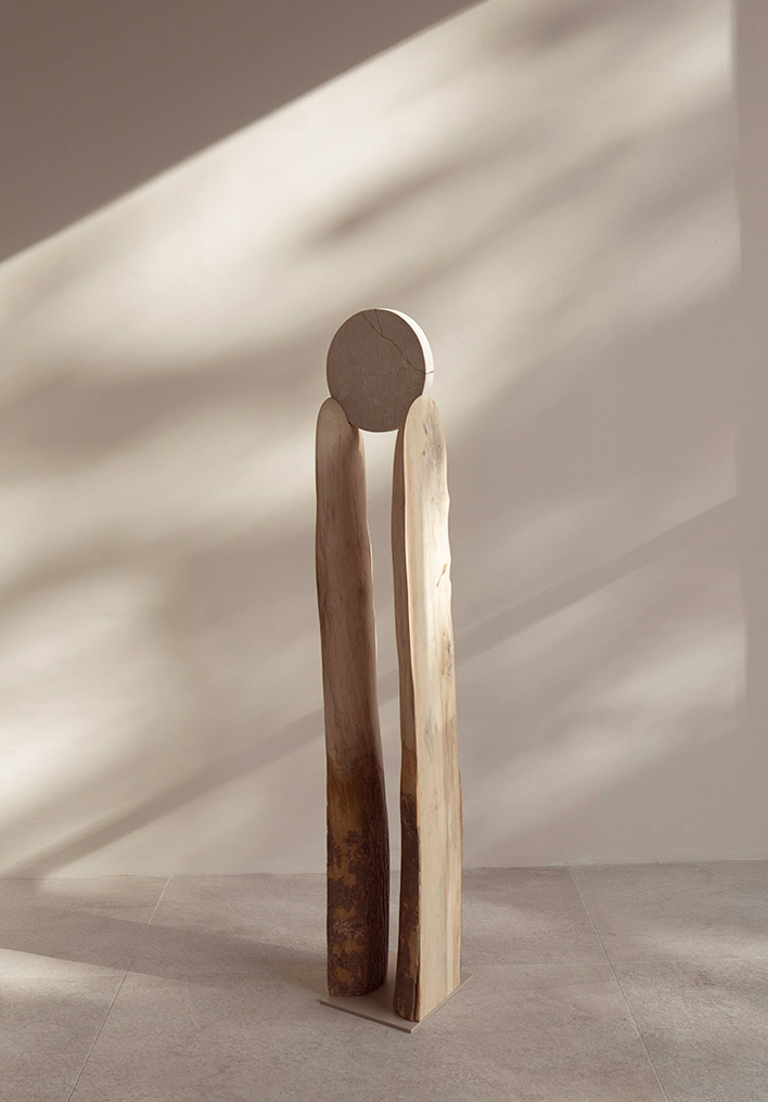 Minimalist art by Barcelona based artist Carla Cascales Alimbau - New moon wood totem.