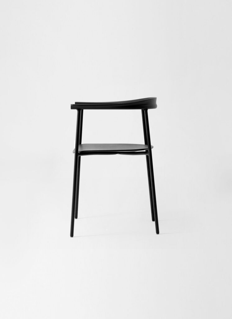 Side view of the T12 Arc Chair by Depping & Jørgensen