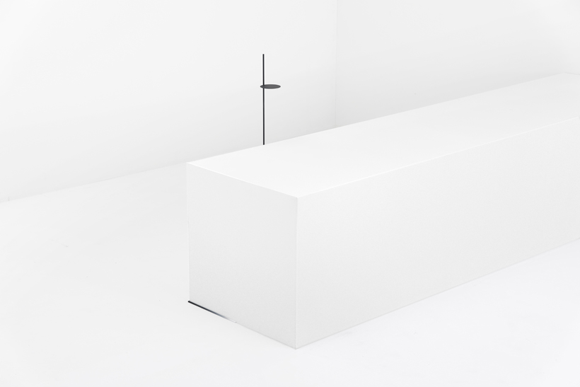 The minimalist table takes advantage of its environment