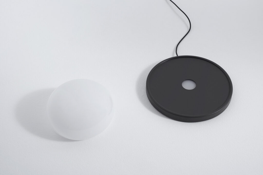 The rounded surface houses the LED bulb of the Bolita Lamp. 