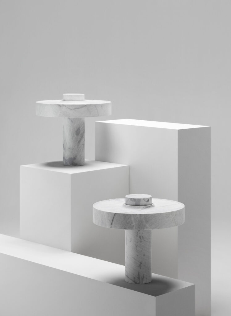 Two minimalist table lamps on podests