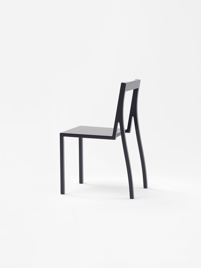 Black minimalist Heel Chair designed by Nendo | Aesence