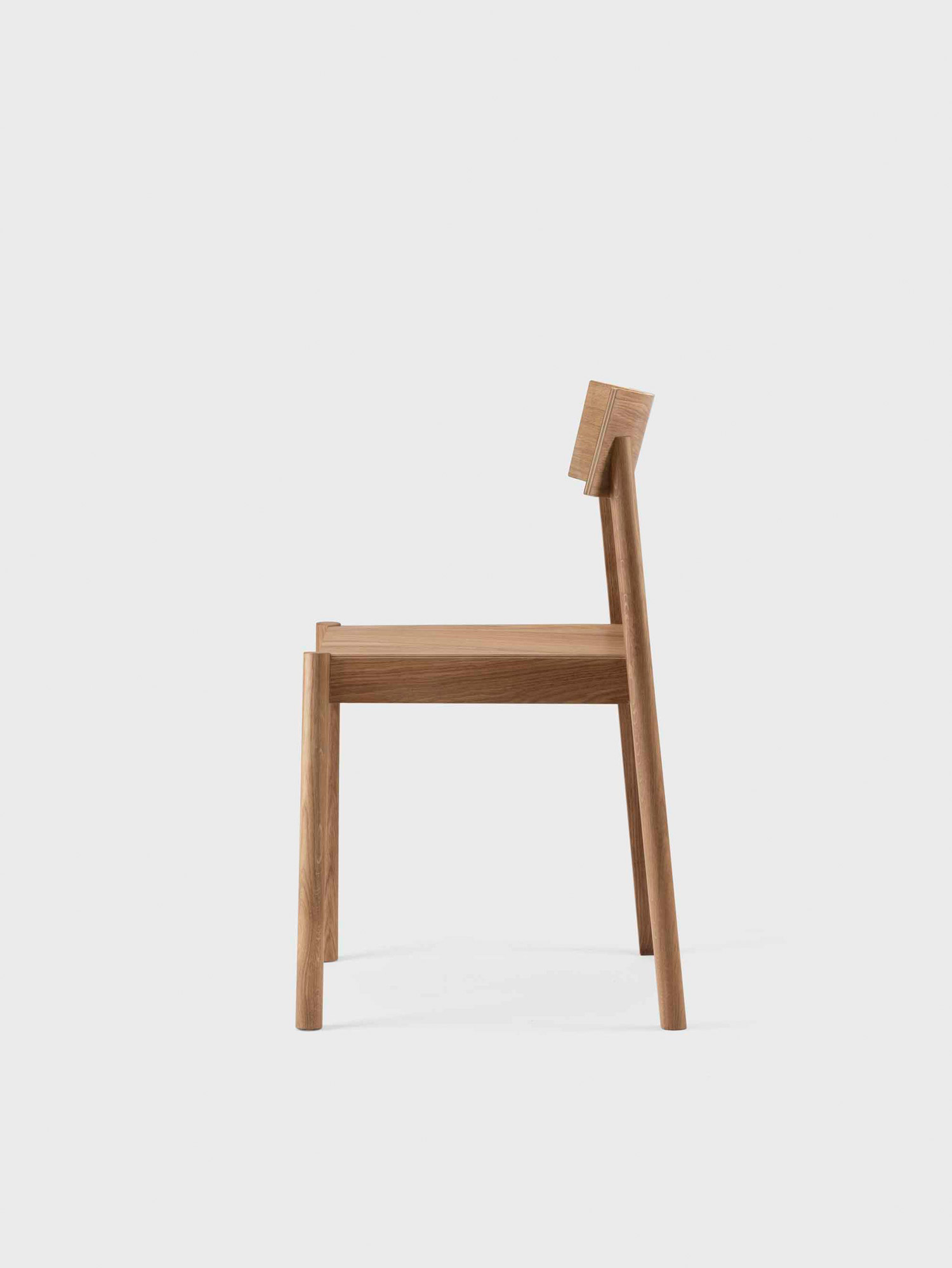 Side View of a Minimalist Chair by etc.etc. Studio