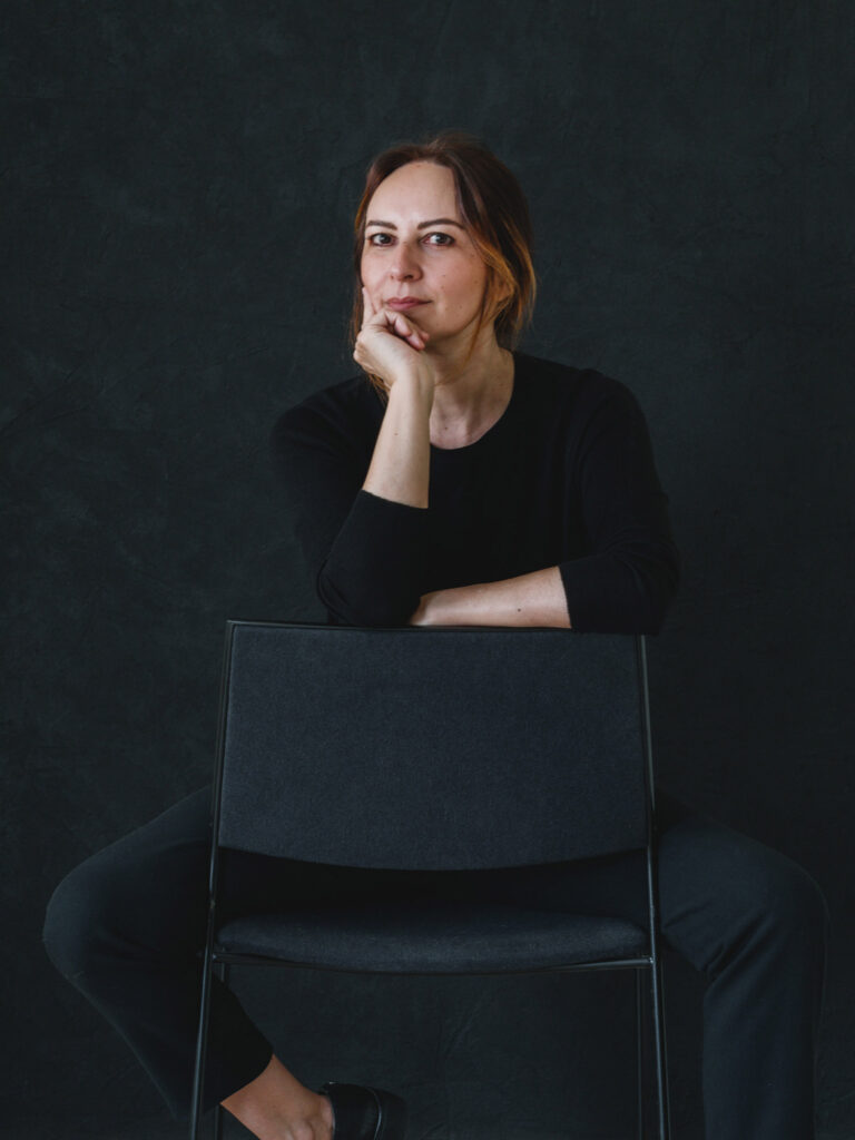 Antonia Ferrer sitting on a chair | In conversation with Antonia Ferrer