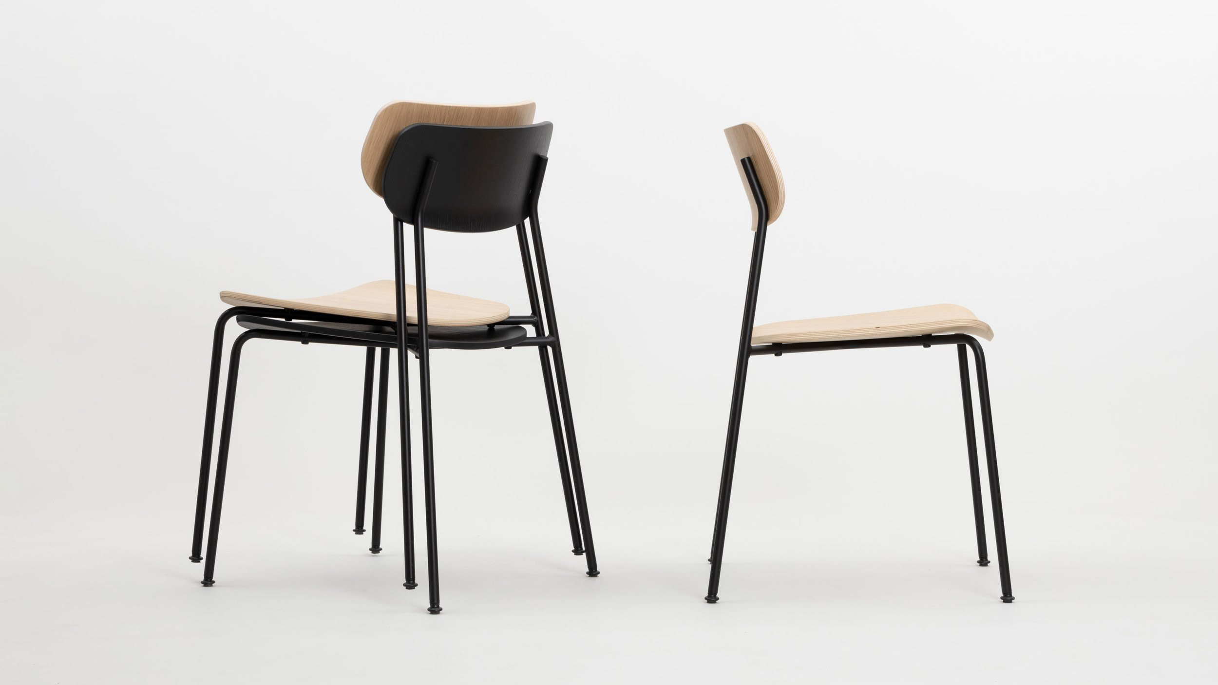 Three minimalist chairs